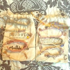 11 Puravida bracelets and 3 bags. Very little wear